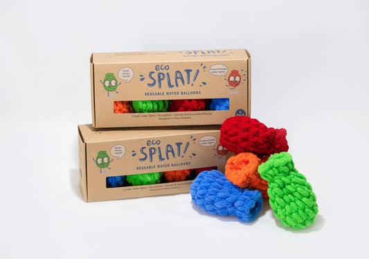 2 boxes of EcoSplat with loose red balloons and other colour balloons