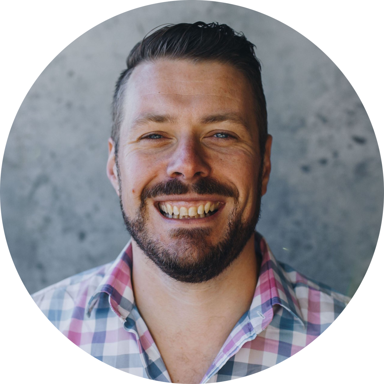 A headshot of Tim Jones